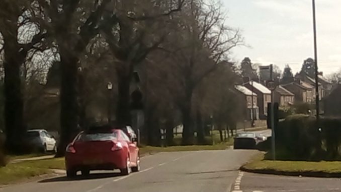Car heads towards a Vehicle Activated Sign in Great Ouseburn near Boroughbridge