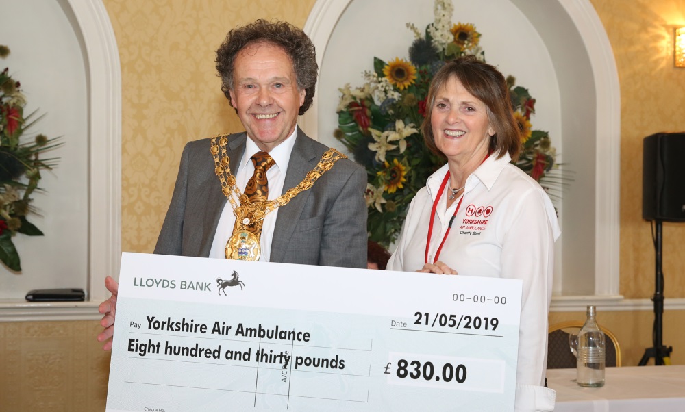 Hambleton Council chairman hands over money to Yorkshire Air Ambulance Hambleton Today