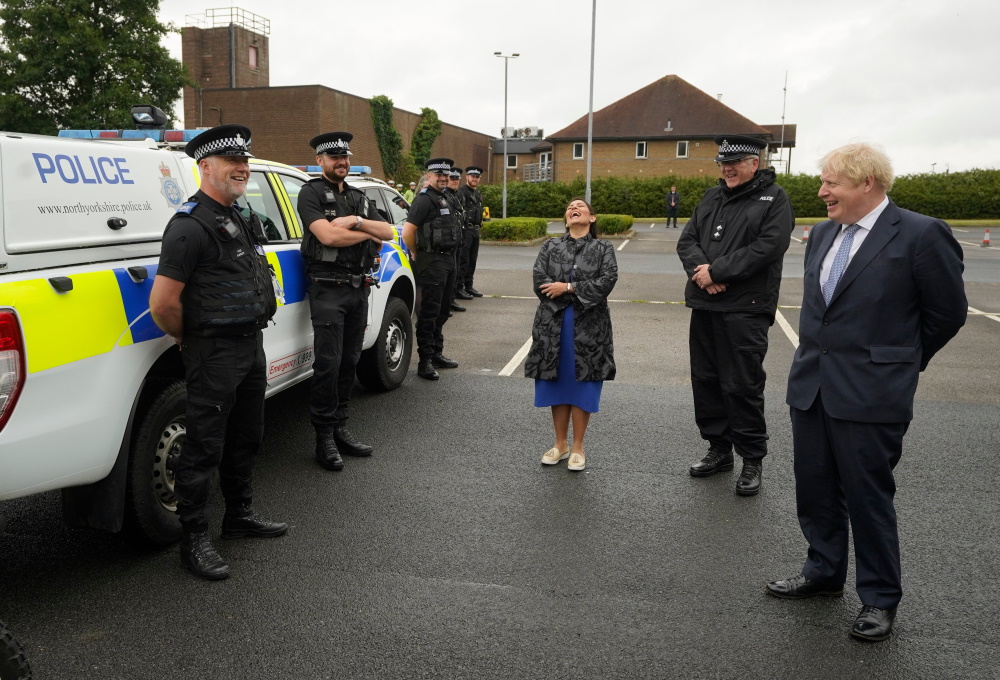 Boris Johnson and Priti Patel speak to North Yorkshire Police officers.  